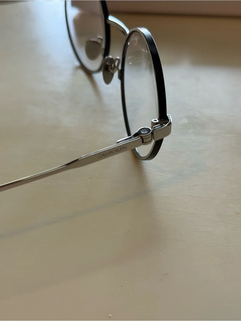 Calvin Klein Silver Round Metal Eyeglasses with Tortoiseshell Temples